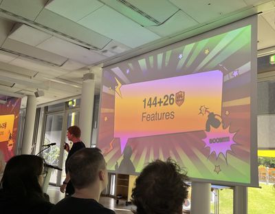 Slide with large letters: 144+26 features