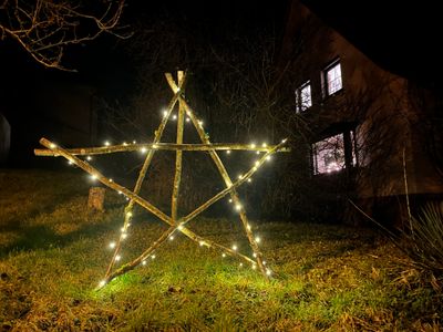 My self-made star with fairy lights in front of our house